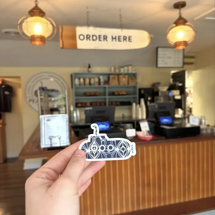 The order counter under an ORDER HERE sign